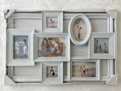 Brand new, sealed photo collage frame. Overall size: 25 x 16 in. Frames sizes: One - 5x6 in One - 5x...
