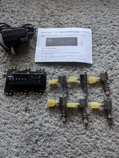 Robotic automatic guitar tuners for Les Paul guitars, View more