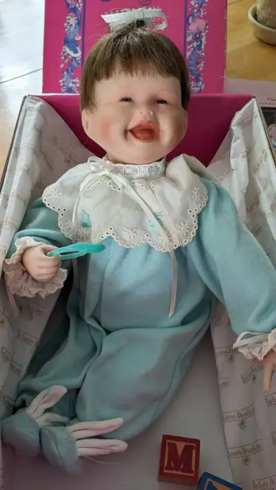 The Ashton-Drake Galleries doll, "My First Tooth" by Kathy Barry-Hippensteel. First issue in Happine...