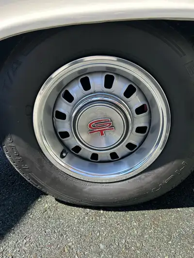 14 inch with 225/70/14 tires, centre caps and trim rings Call 709-689-2645