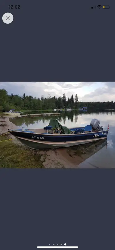 1999 Lund 50 Year Anniversary Aluminum v hull. 40 HP 2 Stroke. Auto mixing. 4 Seater. Side Console....