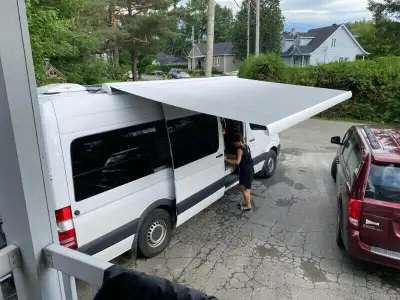 Brand new roof mounted awnings for vans, RVs,or anywhere you want protection from the sun or rain. T...