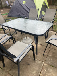 Patio table with six chairs and one umbrella for sale $60
