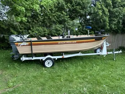 16ft Sylvan Deep V boat 2000 Johnson 50hp 2 stroke with power trim Evinrude 4hp kicker with linkage...