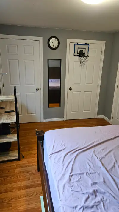 We have one large bedroom available in a clean 3-bedroom house on College Ave W. Room features a Kin...