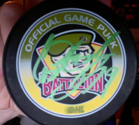 ORIGINAL CODY HODGSON RARE GREEN SIGNED BATTALION HOCKEY PUCK