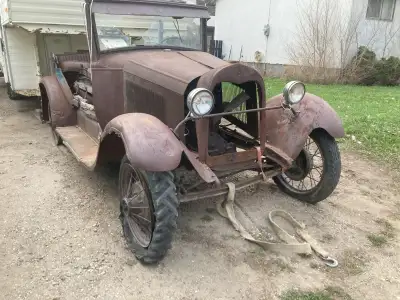 This '28 ForDor Leatherback is a rolling chassis and fairly complete.Clutch and transmission work an...