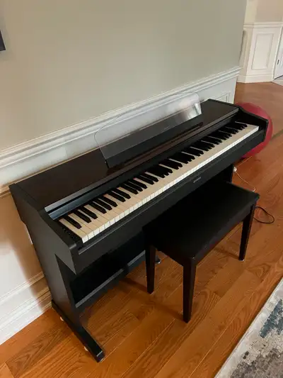 Sparingly used Yamaha YDP-213 digital piano with bench for sale., View more