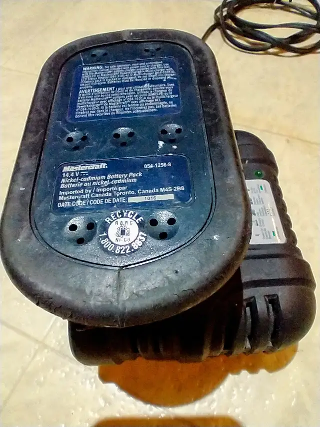 Pair of 14.4 Volt Mastercraft Ni-Cad Batteries and a One Hour62863735717122121
