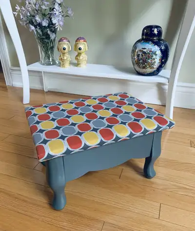 Step up your comfort game with this charming vintage footstool! This footstool features a sturdy fra...
