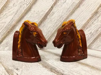 pair of Vintage Blue Mountain pottery harvest gold horse head bookends. These are in good vintage co...