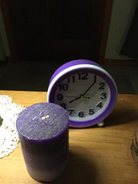 Purple Candle And Clock