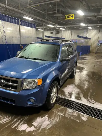 I am selling a 2010 Ford Escape XLT, a reliable SUV known for its versatility and efficiency. This u...