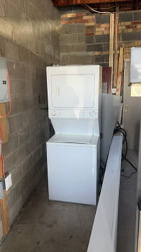27” Laundry Centre stacked washer and dryer excellent working 