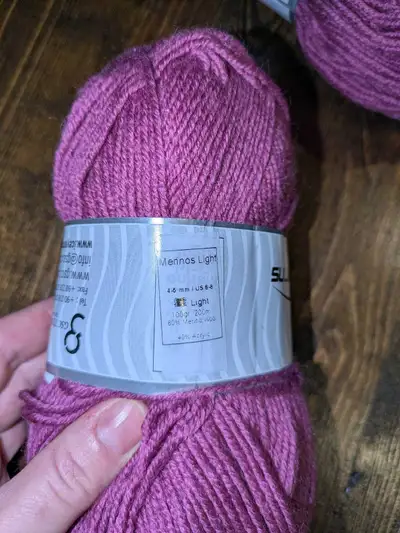 I am selling two skeins of Merino lite yarn in a beautiful fuchsia colour, perfect for your next kni...