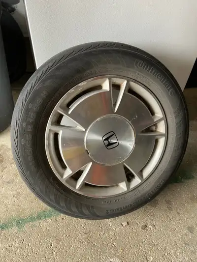 2010 Honda Civic DXG Aluminum Rims. Set of four in great shape, with hub caps. Tires are still on ri...