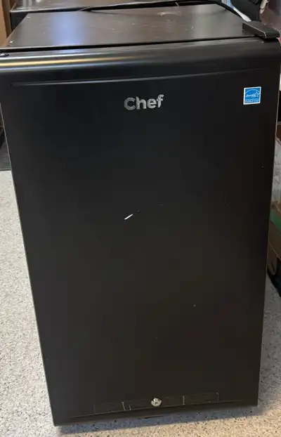 Black danby fridgerator. 34”H, 18”D, 19”W