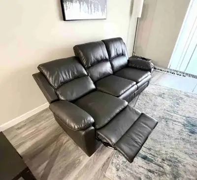 LEATHER-LIKE POWER RECLINING SOFA — $850, View more
