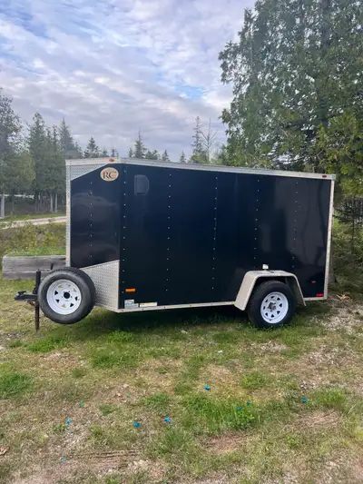 Trailer is in great shape. No rust all. Water tight. Undercoated yearly. Brand new tires, rims, spar...