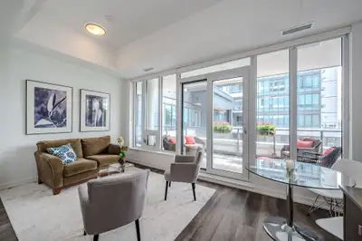 Beautiful 1-bedroom condo with a rare oversized covered private terrace in one of Kitchener’s most s...
