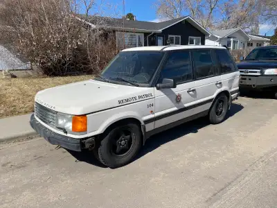 P38 Range Rover. Complete vehicle but air ride has aftermarket compressor. Seems like the cats are p...
