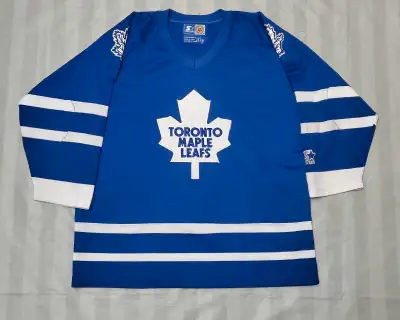 B 8C Here we have a pre owned Toronto maple leafs Starter jersey. In Youth size Large might fit mens...