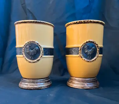 Set of two charming 9-inch ceramic utensil holders by Pier 1 Imports, featuring a rustic yellow glaz...