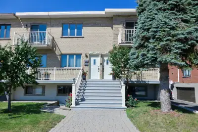 Located on the upper floor of a triplex. Bright apartment with wooden floors throughout. Patio doors...