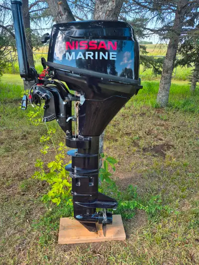New, never used, Tohatsu 9.8 hp., 4 stroke, electric start, outboard motor who at the time, as I hav...