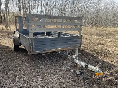 Used 5' 6" x 10' Snowmobile/Utility trailer - actual internal measurements. New LED lights, both whe...