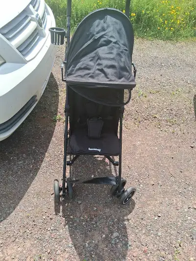 harmony Black fold-up stroller.Looks to be in good shape. I can deliver it depending how far you are...