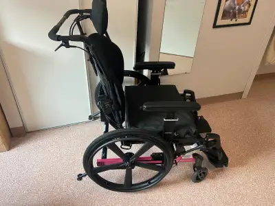 Large Tilted Wheelchair - barely used, with extra pad. Used for 6 months a few hours a day if that....