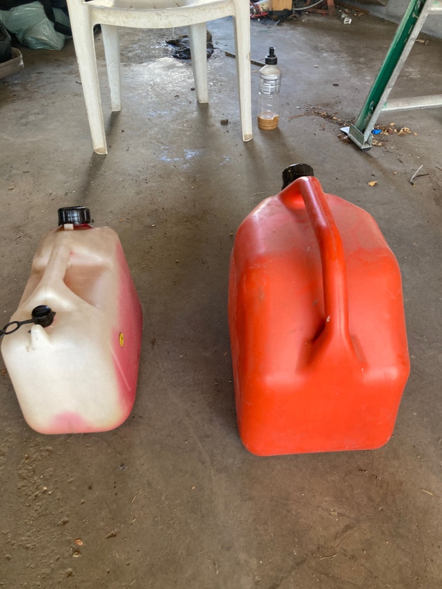 Five gallon gas jug and Two gallon gas jug 10 obo Snowmobiles Parts