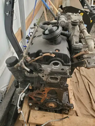 Engine from 2005 TDI Jetta Wagon made in Germany . Will have to be rebuilt blowing oil. No turbo or...