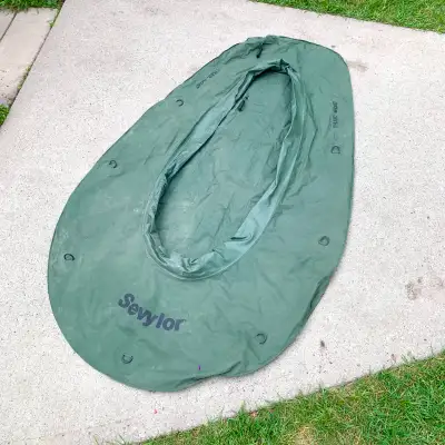 Inflatable trail boat, fishing boat, raft for outdoor recreation on lakes, ponds, and calm water. Gr...
