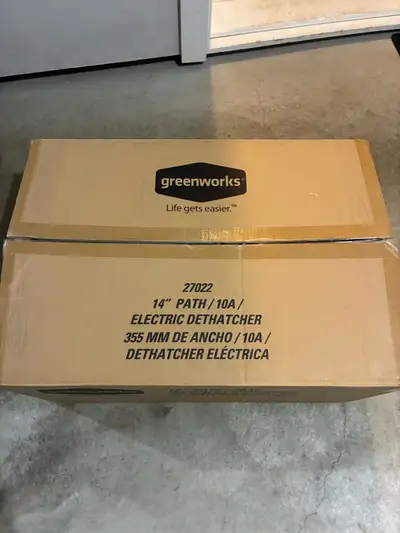 Greenworks electric lawn detatcher. Great condition. Powered with an extension cord. Original manual...