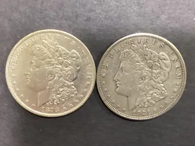 1878 - P and 1921 - D USA. MORGAN SILVER DOLLAR COINS, View more