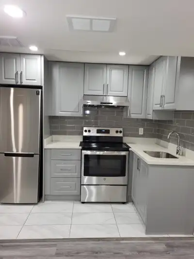 This bright 1-bedroom basement suite features a modern, fully renovated kitchen with stainless steel...