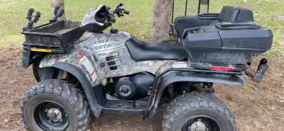 I'm selling a Polaris Sportsman 700, known for its robust performance and reliability, it's a versat...