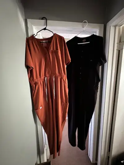 2 XL scrub jumpsuits only worn 2-3 times. $125.00 for both.