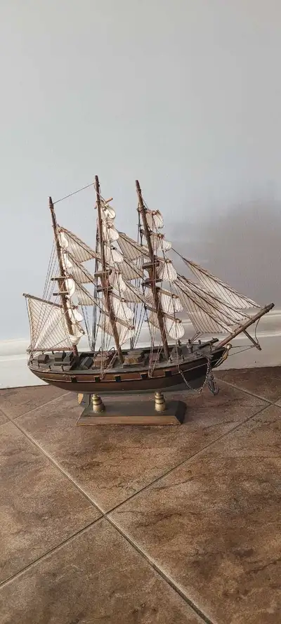 Ahoy there, mateys! Feast your eyes on this meticulously crafted, vintage-style model ship, a true t...