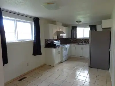 Two-bedroom, legal walkout suite includes utilities