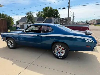 1970 Plymouth Duster 360 engine with a 727 trani that has shift kit and 3500 stall. The rear diff is...