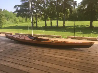 Brand new sturdy yet lightweight, 12 foot long, 21 inch beam, epoxied and varnished marine grade oko...