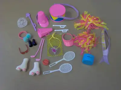 Lot of vintage Barbie athletic themed accessories, View more