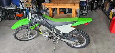 I am selling a Kawasaki KLX 140 with electric start, a reliable and fun dirt bike that's ready for t...