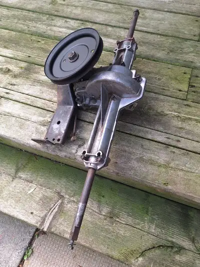 White outdoors riding mower tranny, View more