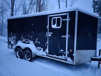 Raised 7x16. 2015 trailerWon't drag ground.. roof vent. Windows.. 110 v light inside swelling as 12...