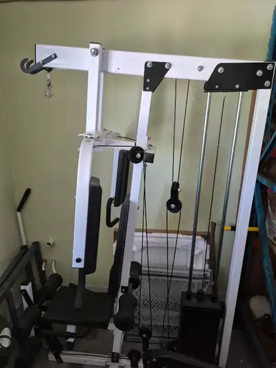 Pull down, pec fly, chest press, leg extension etc machine Cables need work. Priced to sell