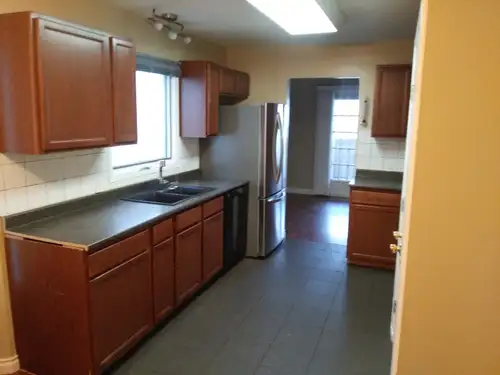 This two storey six bedroom home in Timberlea is within walking of shopping, restaurants, schools an...